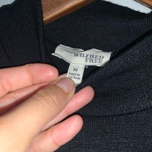 Black high neck open back body suit